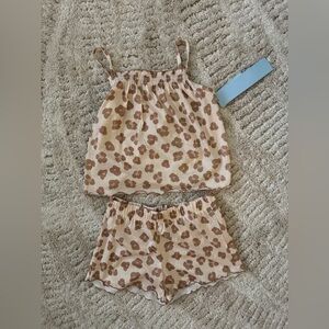 Cat & Jack Girls' or Toddler Girls' two-piece pajama set in a leopard print